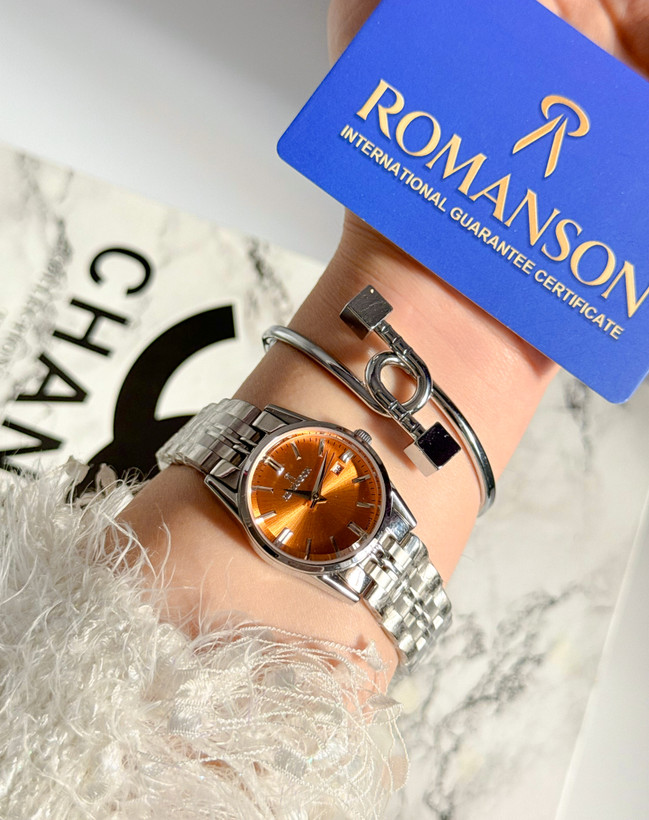 ساعت مچی زنانه صفحه نارنجی برند رومانسون کد steel0۷